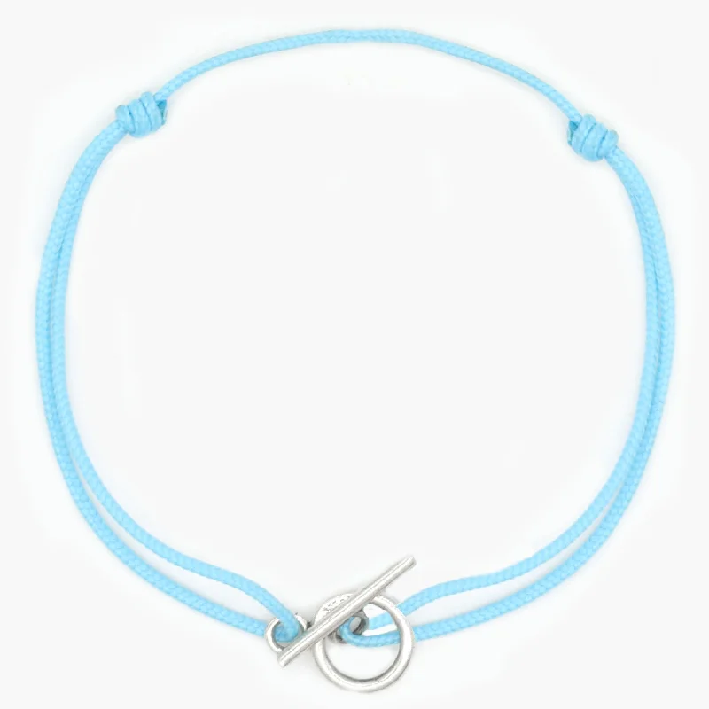 Slotted vent bracelet-Cord Bracelet With Sterling Silver Toggle (Light Blue)