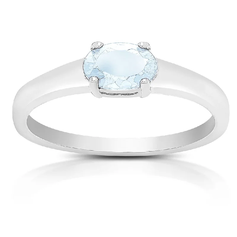 Lunar shine ring-Dolce Giavonna Sterling Silver Blue Topaz Oval Solitaire Ring