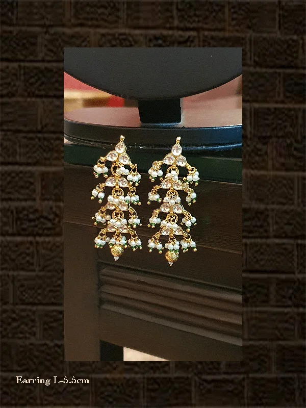 Prairie stalk earrings-Kundan leaf design earring with green bead detailing