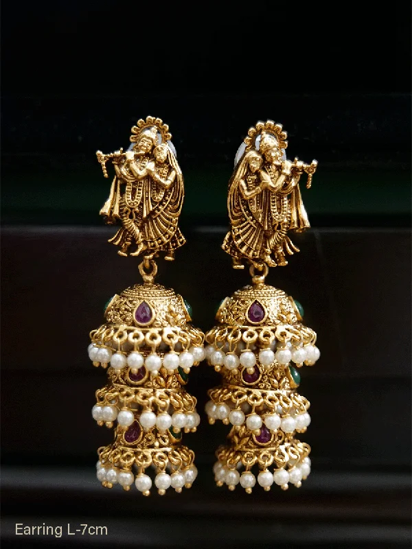 Lined gem earrings-Triple layer radha krishna jhoomki with bead hangings